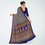 White and Navy Blue Women's Premium Italian Silk Paisley Print Teachers Uniform Sarees With Blouse Piece  White and Navy Blue Women's Premium Italian Silk Paisley Print Teachers Uniform Sarees With Blouse Piece